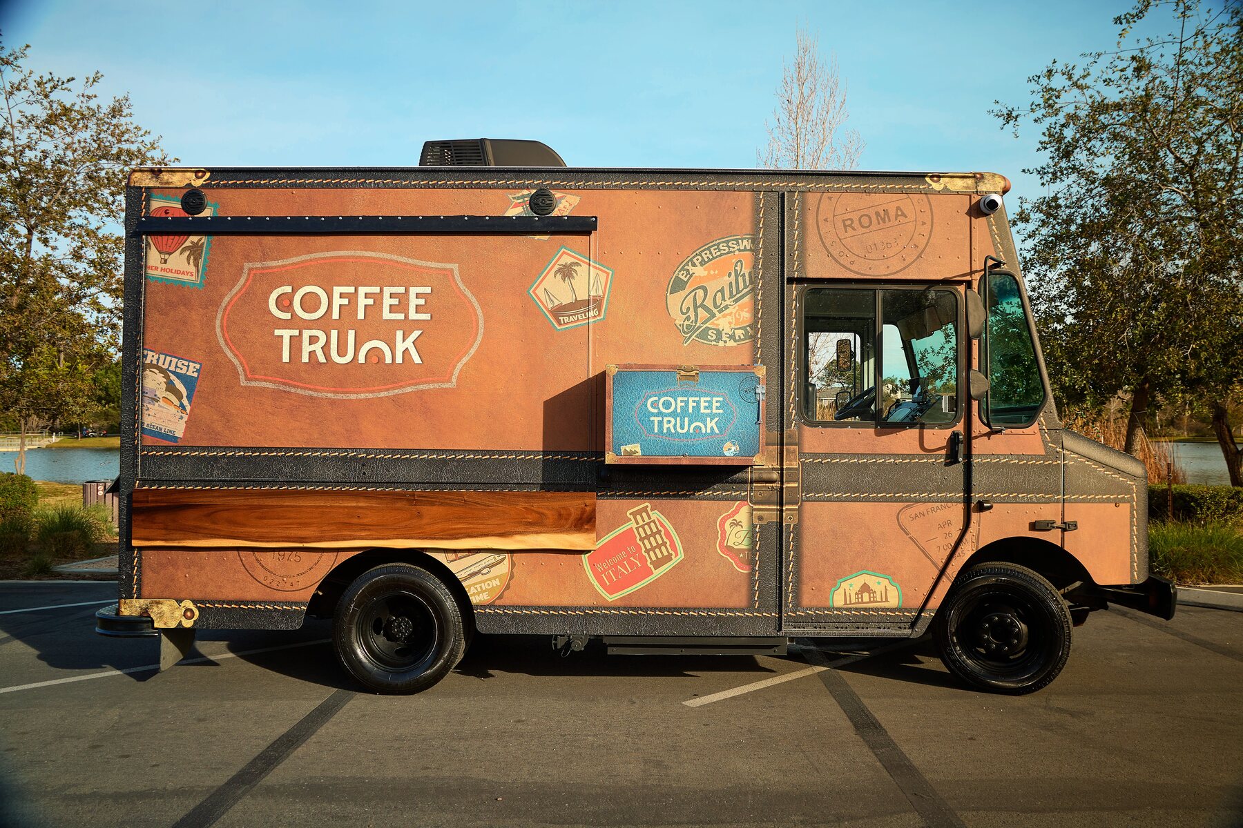 Full side profile of Coffee Trunk’s brown luggage-inspired exterior